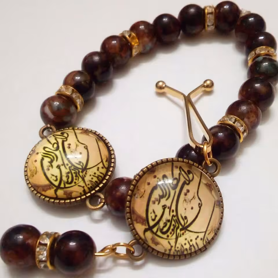 ست دستبند و گیره روسری طرح ان یکاد