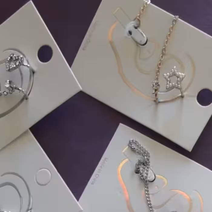 اویز نگهدارنده ایرپاد هندزفری ستاره و نگین طلایی تکی 