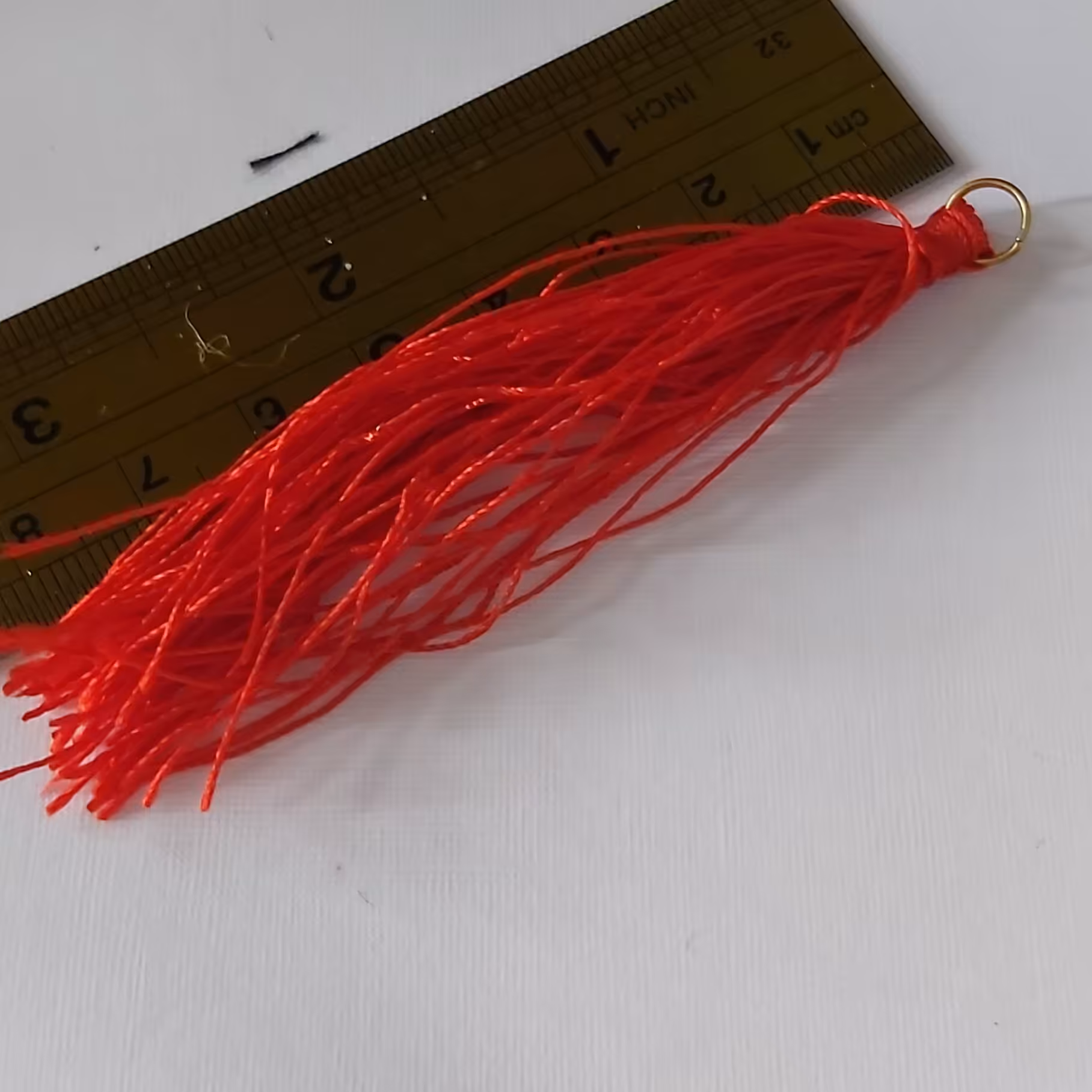 منگوله قرمز یک عددباحلقه