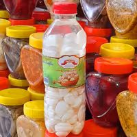 ترشی سیر صدفی سفید درجه یک وزن با بسته بندی(950)گرم