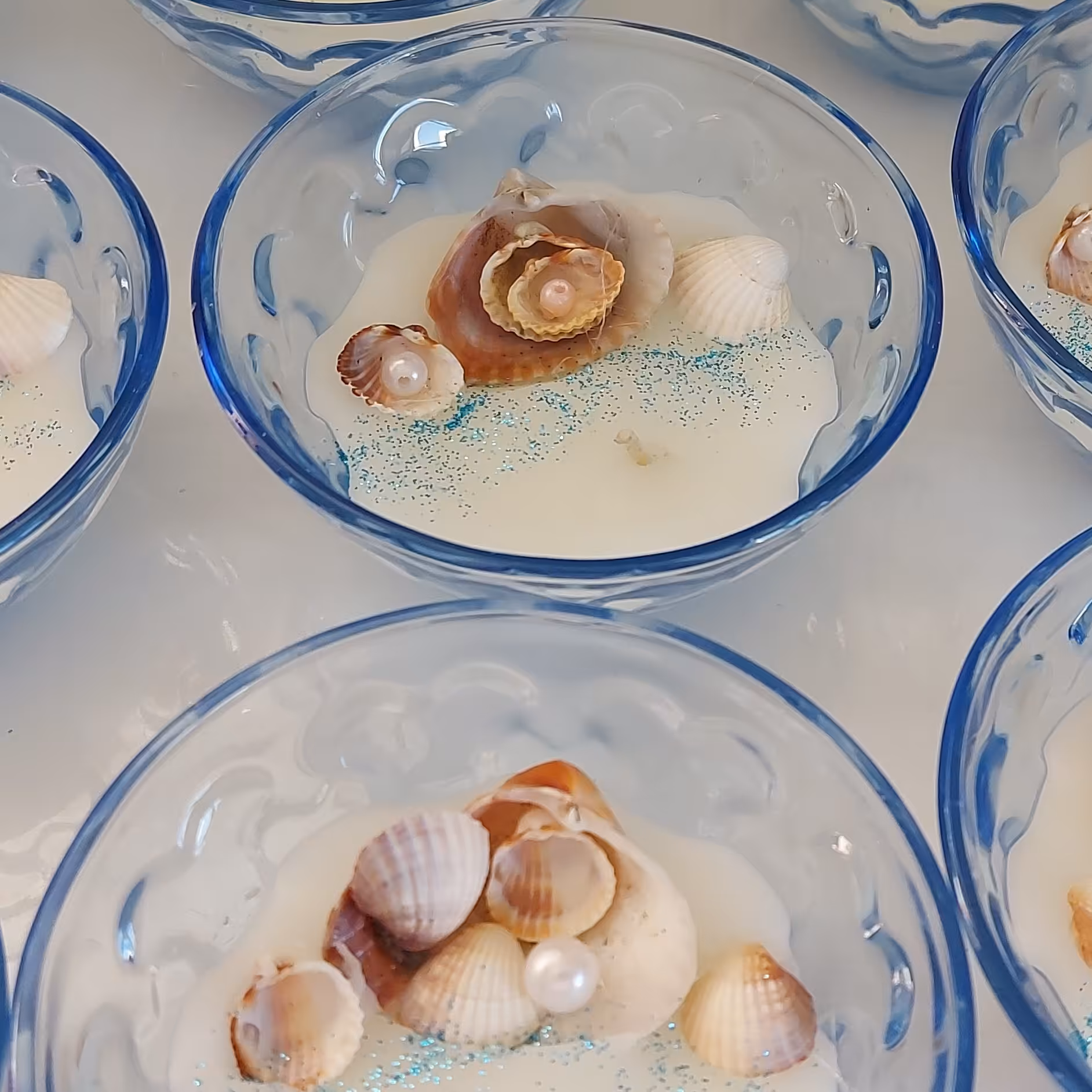 شمع پیاله ای طرح دریا و صدف و مروارید