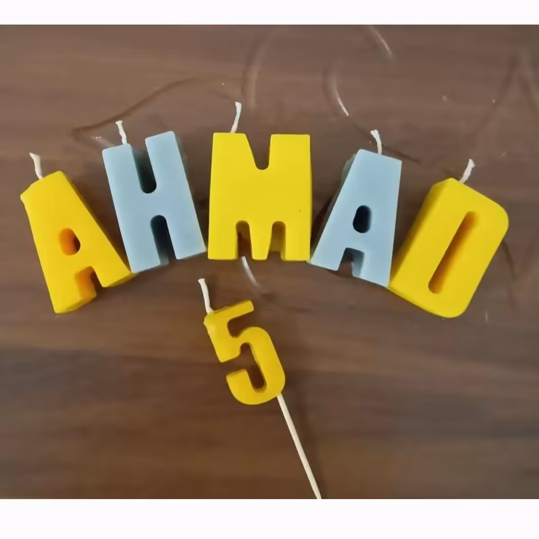 شمع حروف لاتین اسم پسر  احمد تزیینی 