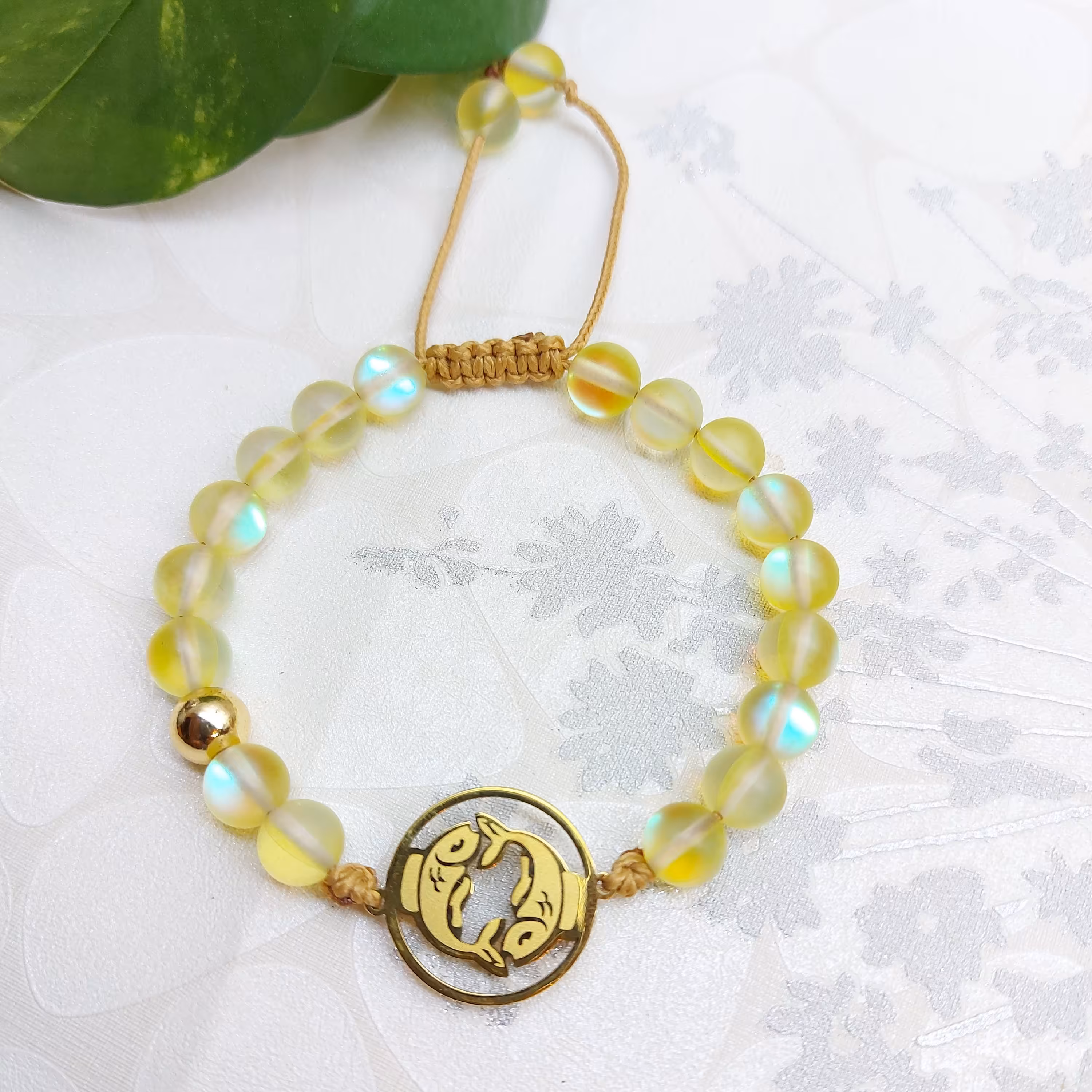 دستبند سنگی مون استون و نماد استیل ماه اسفند