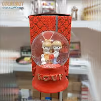 گوی موزیکال بزرگ چرخشی قرمز  (کوکی) با برف مصنوعی و آب