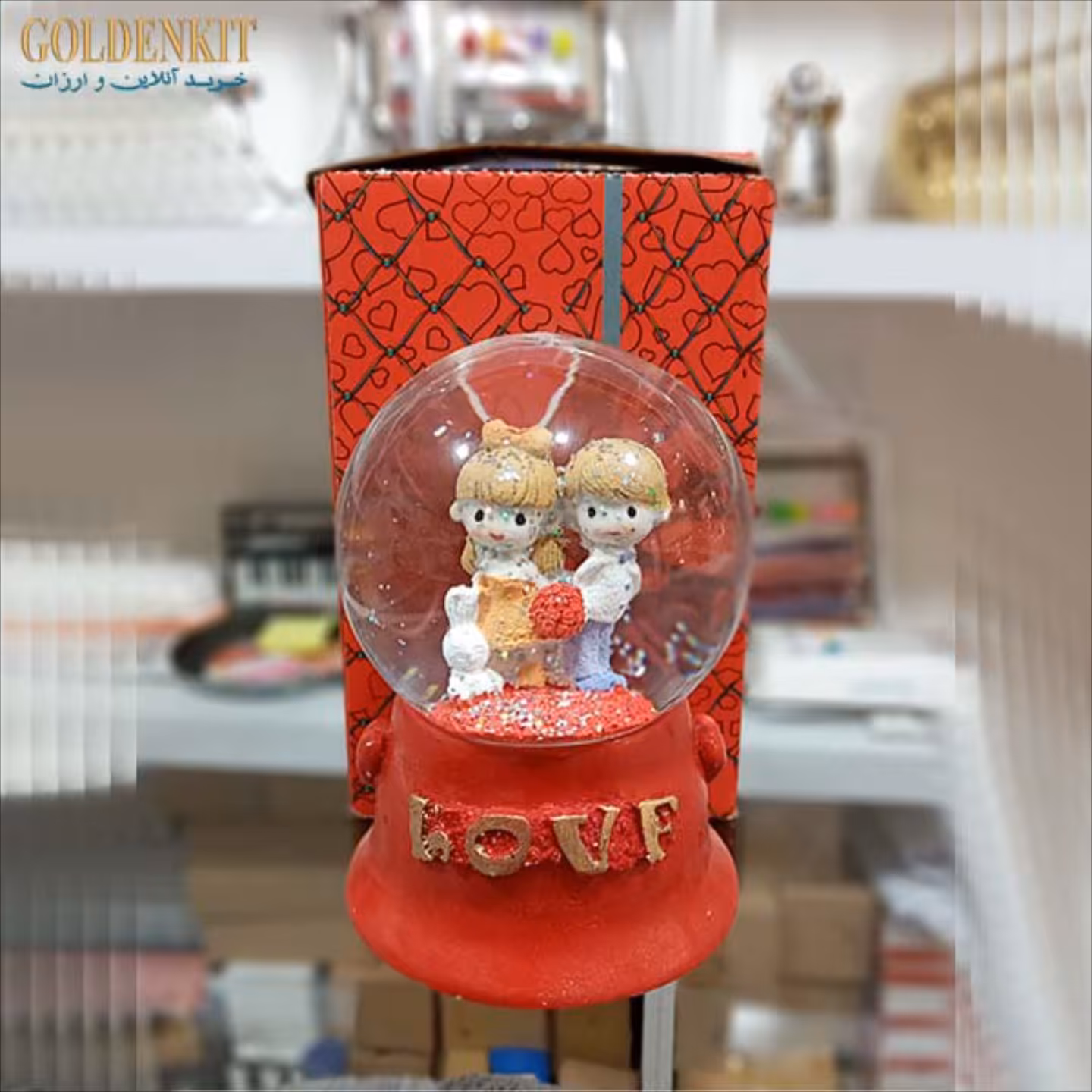 گوی موزیکال بزرگ چرخشی قرمز  (کوکی) با برف مصنوعی و آب