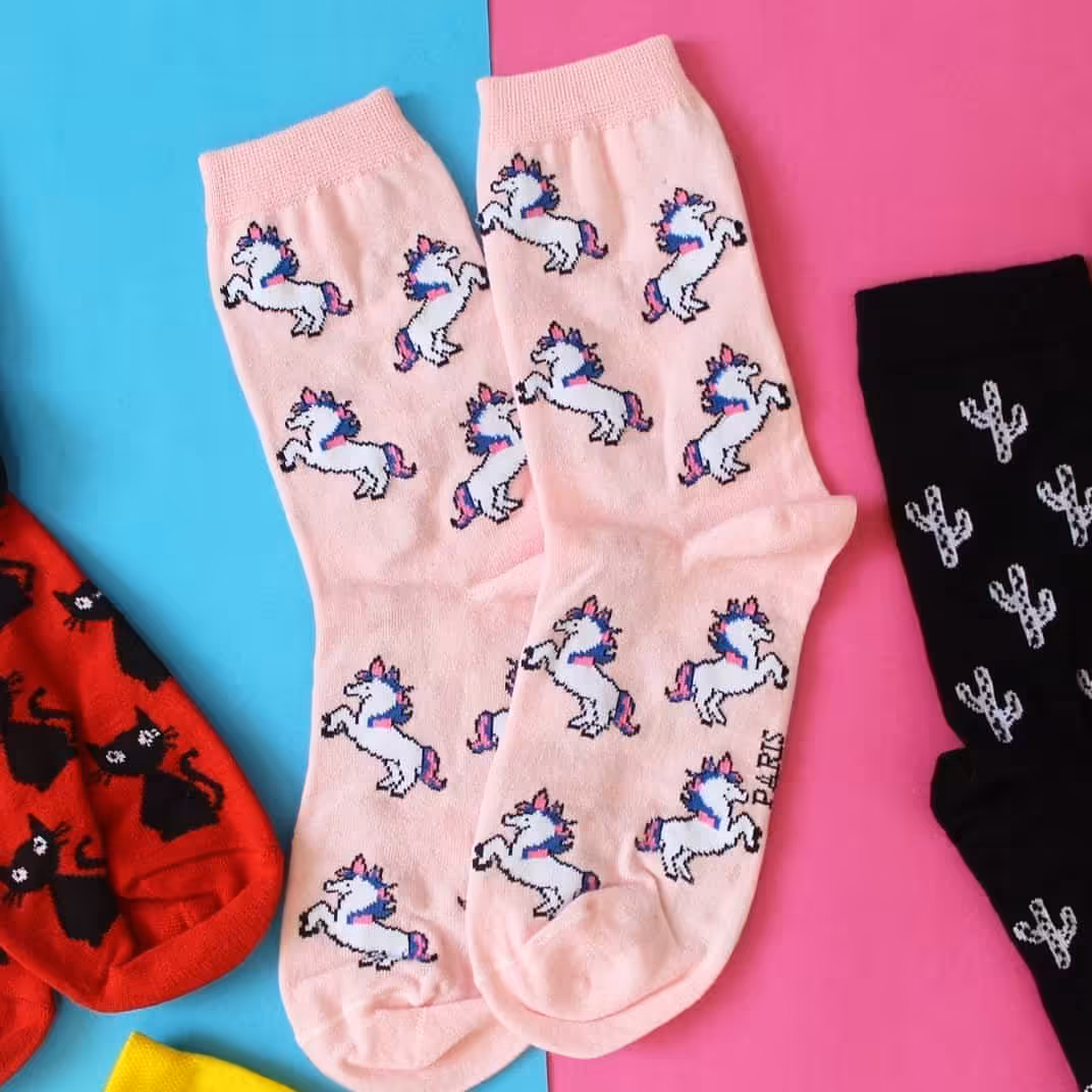 جوراب ساق دار طرح اسب تک شاخ زمینه صورتی فری سایز