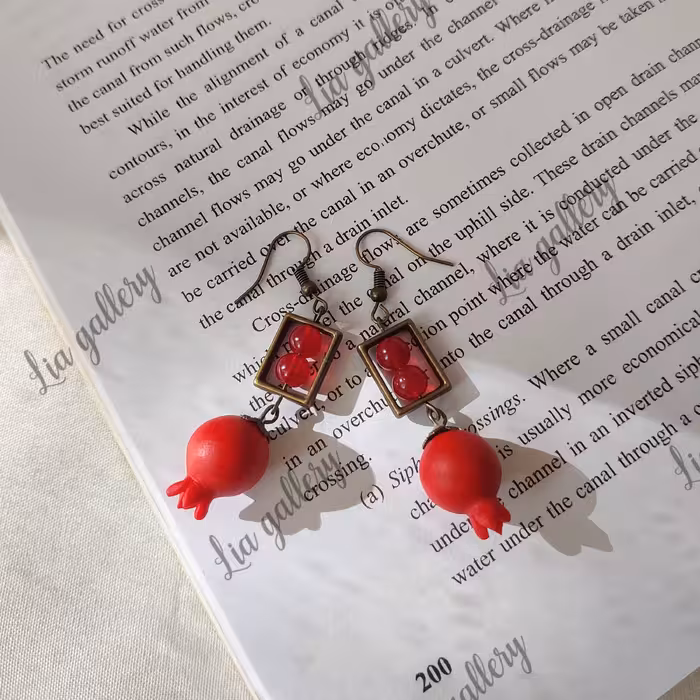 گوشواره یلدایی،گوشواره انار،گوشواره نارنگی،گوشواره آویز،دخترانه،ست دوستی،ولنتاینی،گوشواره خرمالو،خرجکار انار،میوه خمیری،