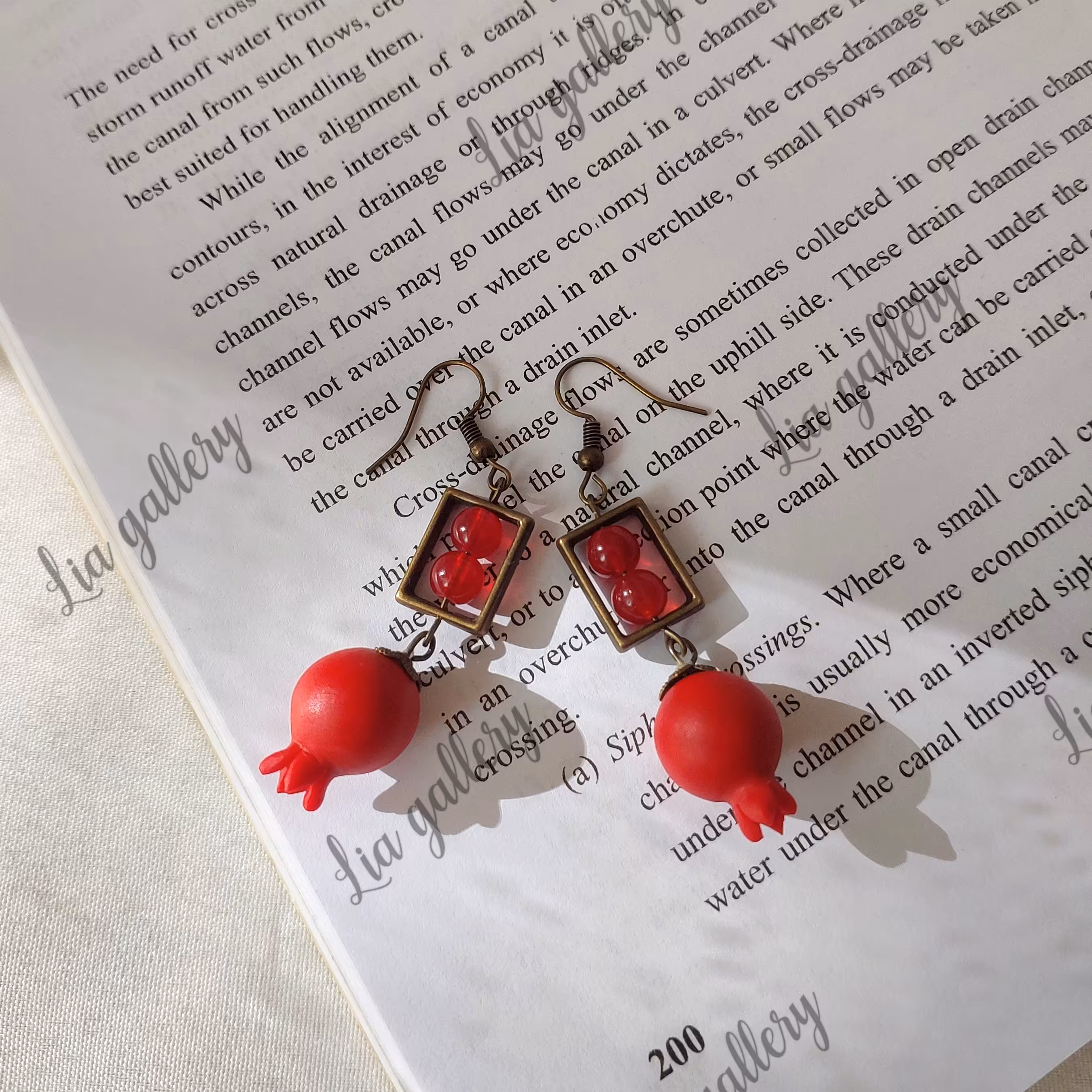 گوشواره یلدایی،گوشواره انار،گوشواره نارنگی،گوشواره آویز،دخترانه،ست دوستی،ولنتاینی،گوشواره خرمالو،خرجکار انار،میوه خمیری،