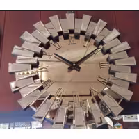 ساعت دیواری لوکس خوشیدی طلایی