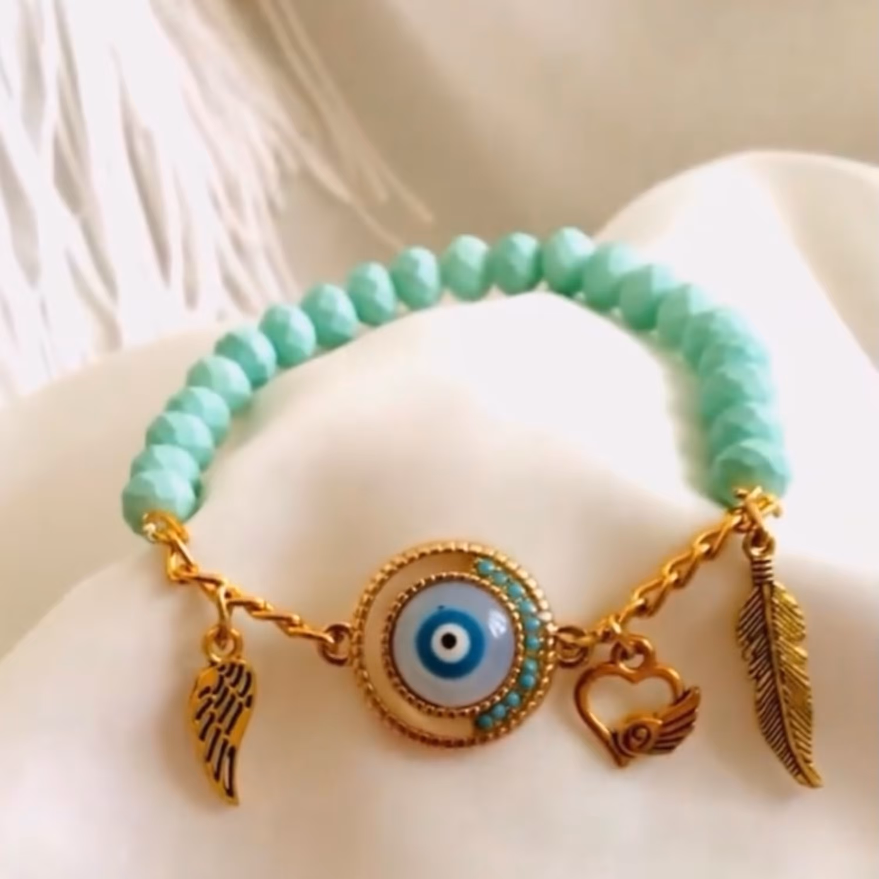 دستبند چشم نظر مهره اونیکس مات و زنجیر