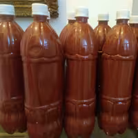 رب گوجه فرنگی خانگی درجه یک  خالص طبیعی و ارگانیک در بطری یک ونیم لیتری 