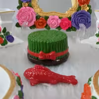 ماهی سفالی رنگی همراه سبزه عید