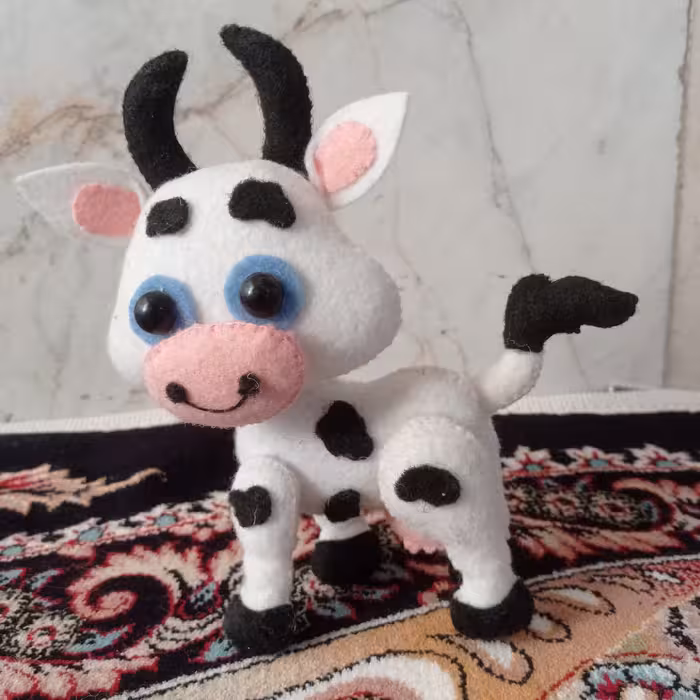 عروسک نمدی گاو