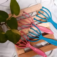 ماساژور سرگوی مخصوص روغن تراپی  مو 