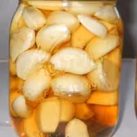 ترشی سیر صدفی محلی شمال 5ساله ظرف 750گرمی