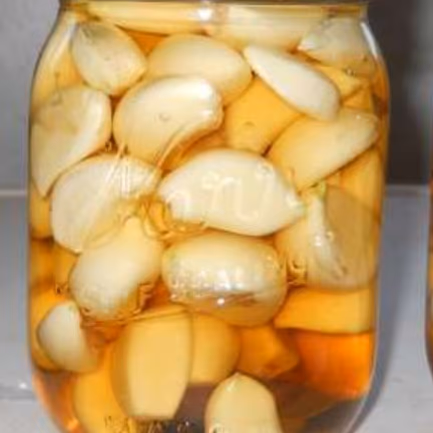 ترشی سیر صدفی محلی شمال 5ساله ظرف 750گرمی