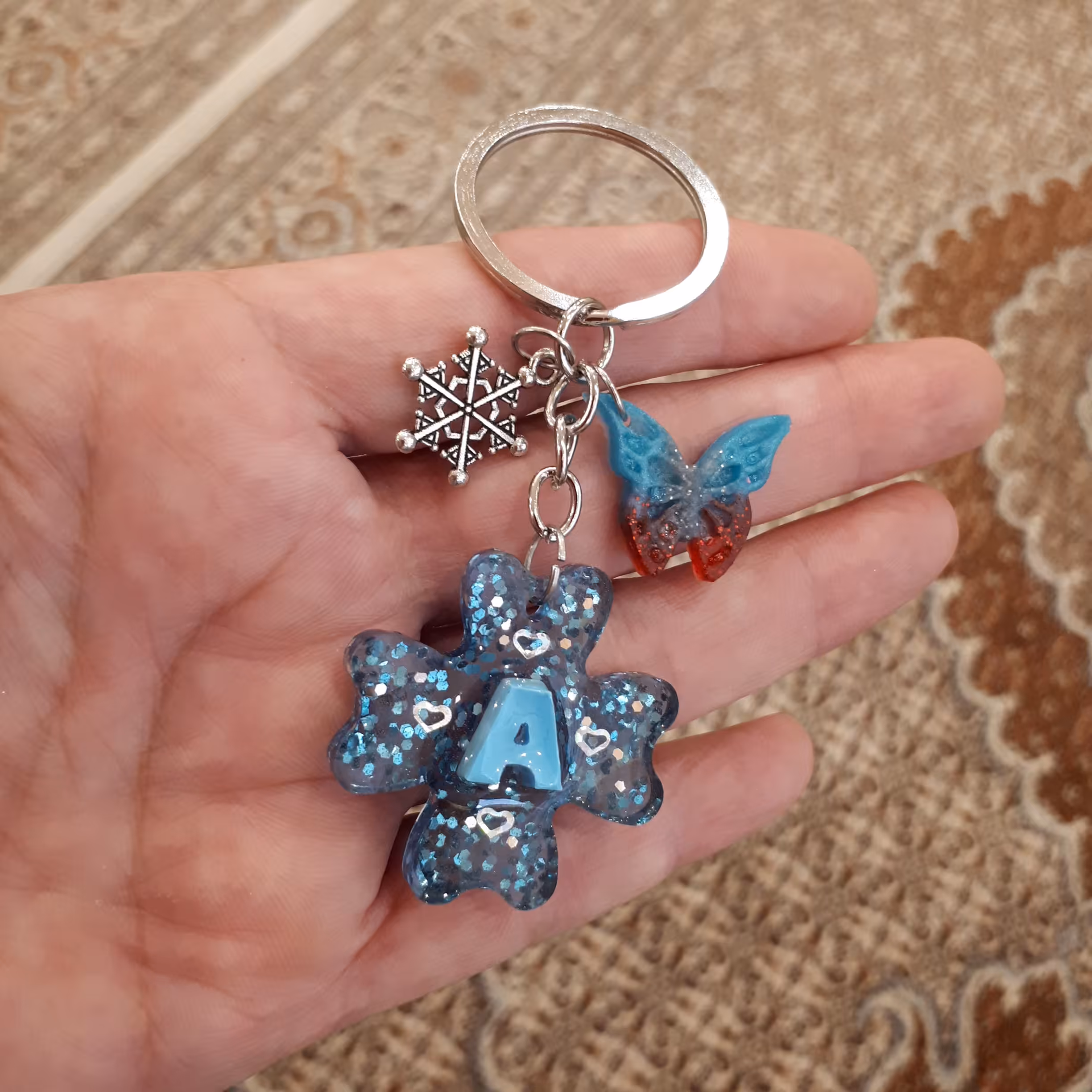 سرکلیدی رزینی آبی پروانه دار 