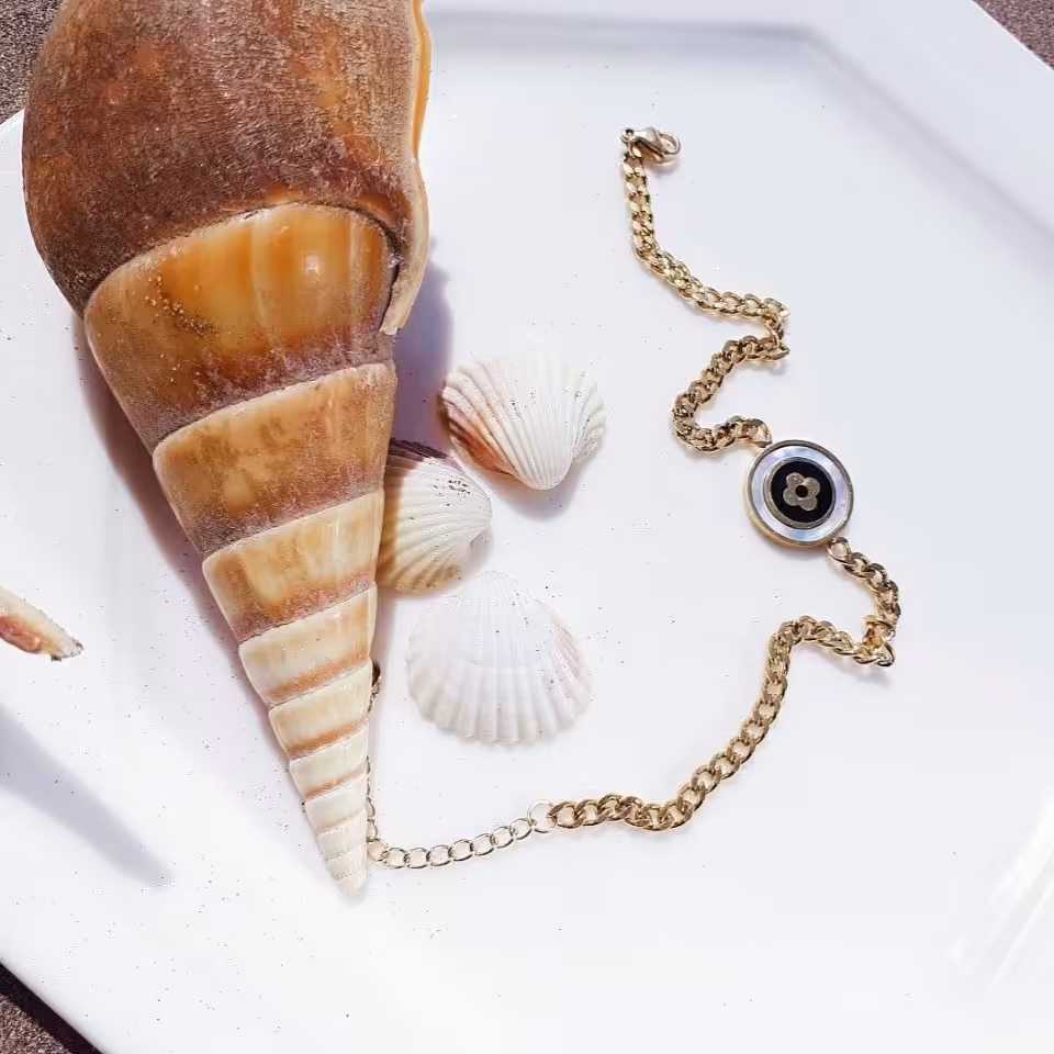 دستبند کارتیر  استیل صدفی طلایی 