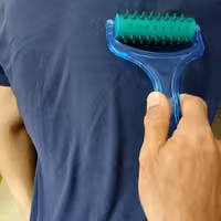 ماساژور دستی بدن تن زیب