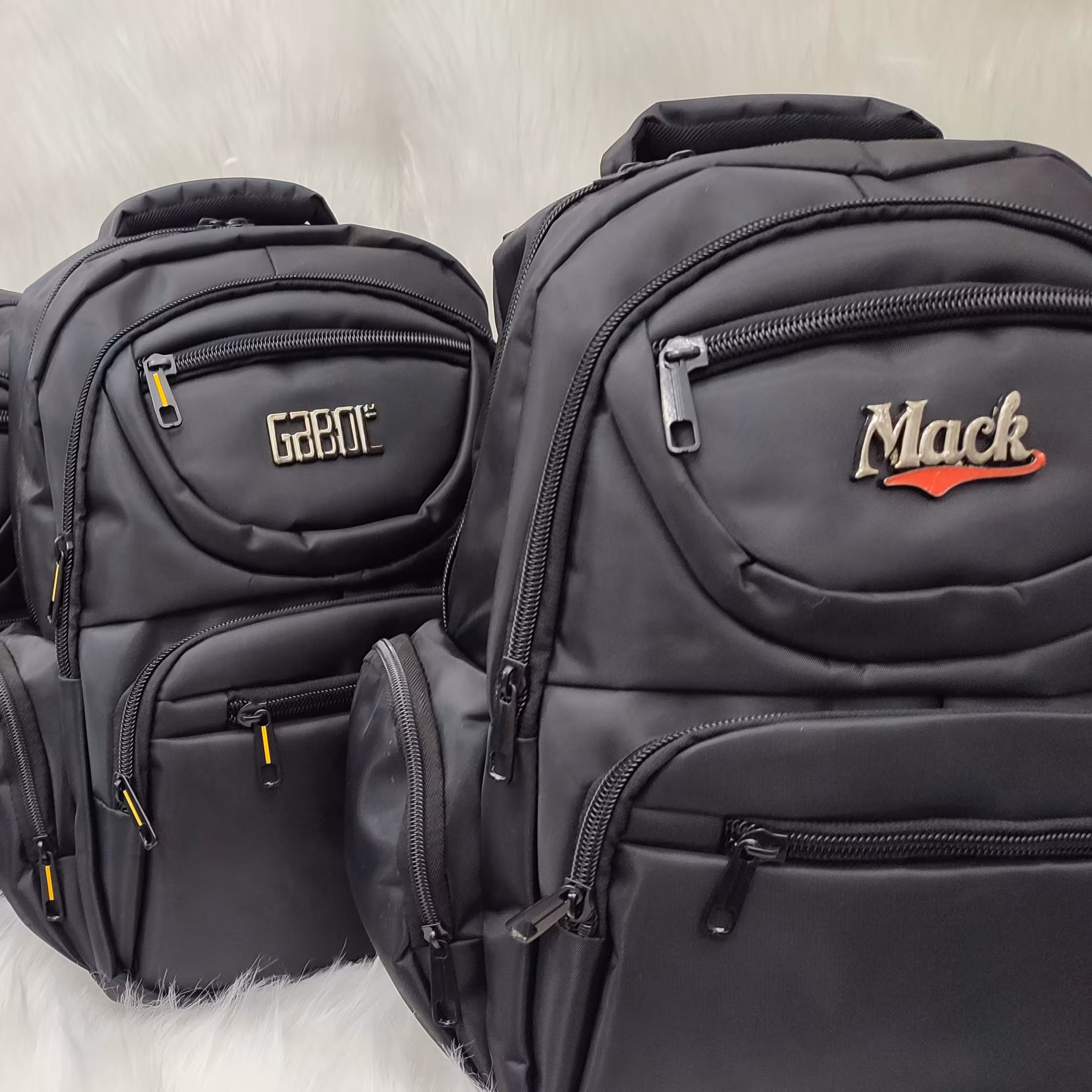 پک 10عددی کیف کوله پشتی در رنگ های مشکی و سرمه ای  