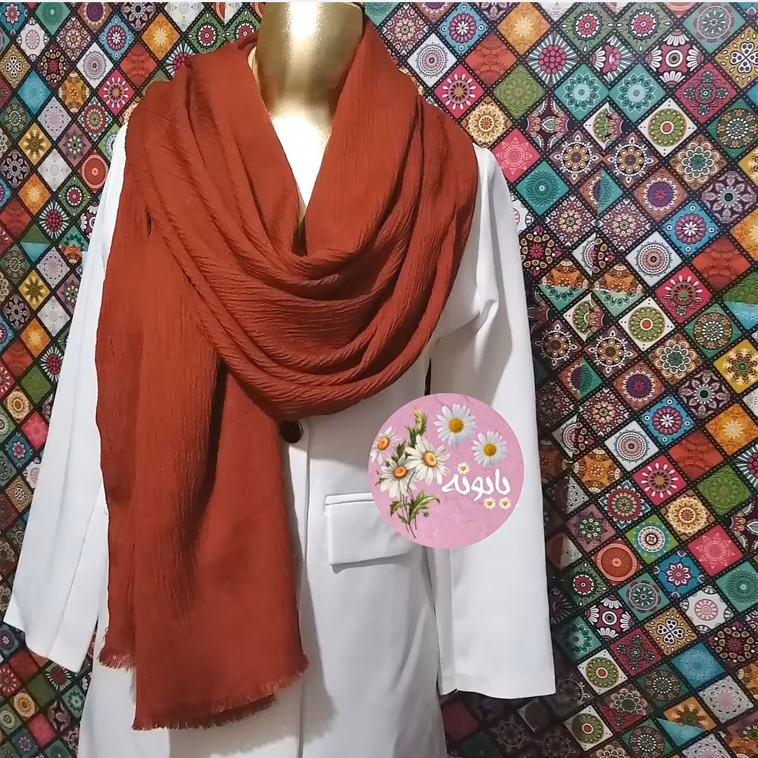 شال پفکی رنگ فندقی اندازه تقریبی 190 در 70 سانت متغیر جنس نخ دو لب دوخت دو لب ریش