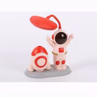 چراغ مطالعه شارژی و تراش دار طرح آدم فضایی رنگ گلبهی