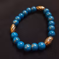 دستبند دستساز مهره‌ای آبی طرح فیروزه گرد