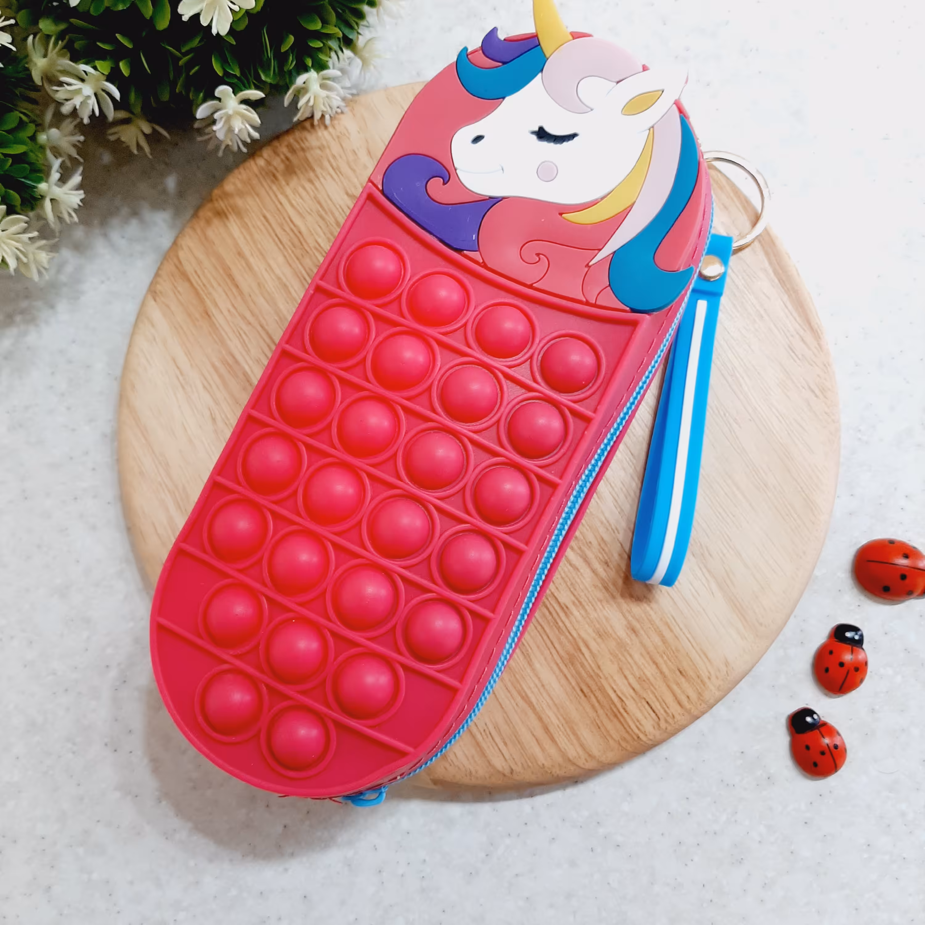 جامدادی سیلیکونی پاپیتی فانتزی طرح تکشاخ سرخابی