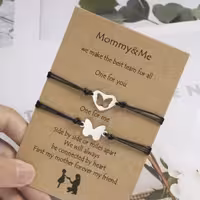 دستبند ست پروانه استیل اصل، قفل بافت،  با بند مشکی یا  سفید