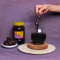 شیره خرما چکه ای 1000 گرمی(چومه) تُل تَل