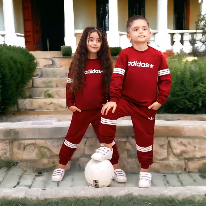 ست بلوز شلوار آدیداس خطی مناسب  1 سال تا نوجوان طرح چاپی