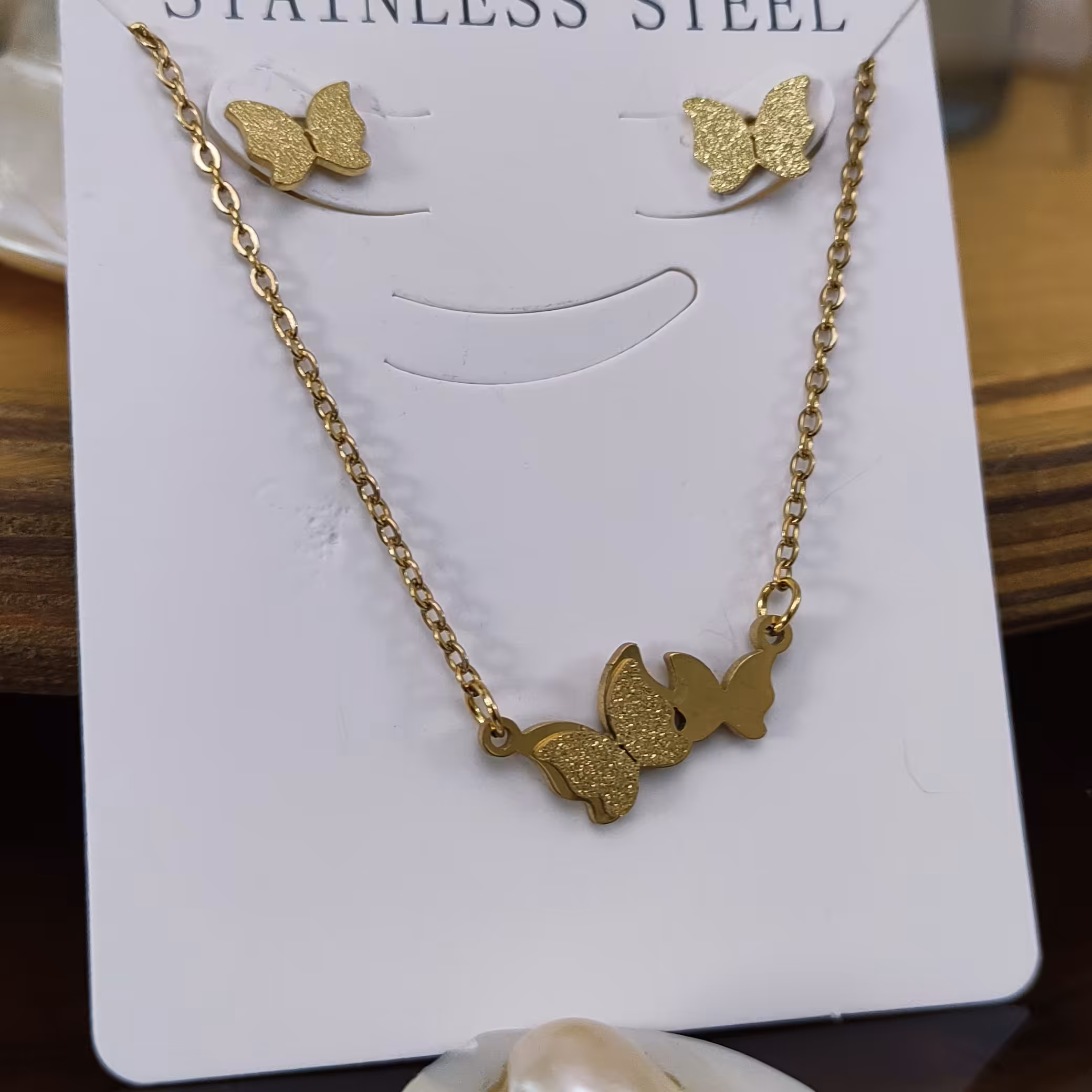 نیم ست پروانه دوتایی استیل رنگ ثابت شامل گوشواره و گردنبند بدلیجات و زیورآلات و اکسسوری زنانه و دخترانه کادو و هدیه بدل