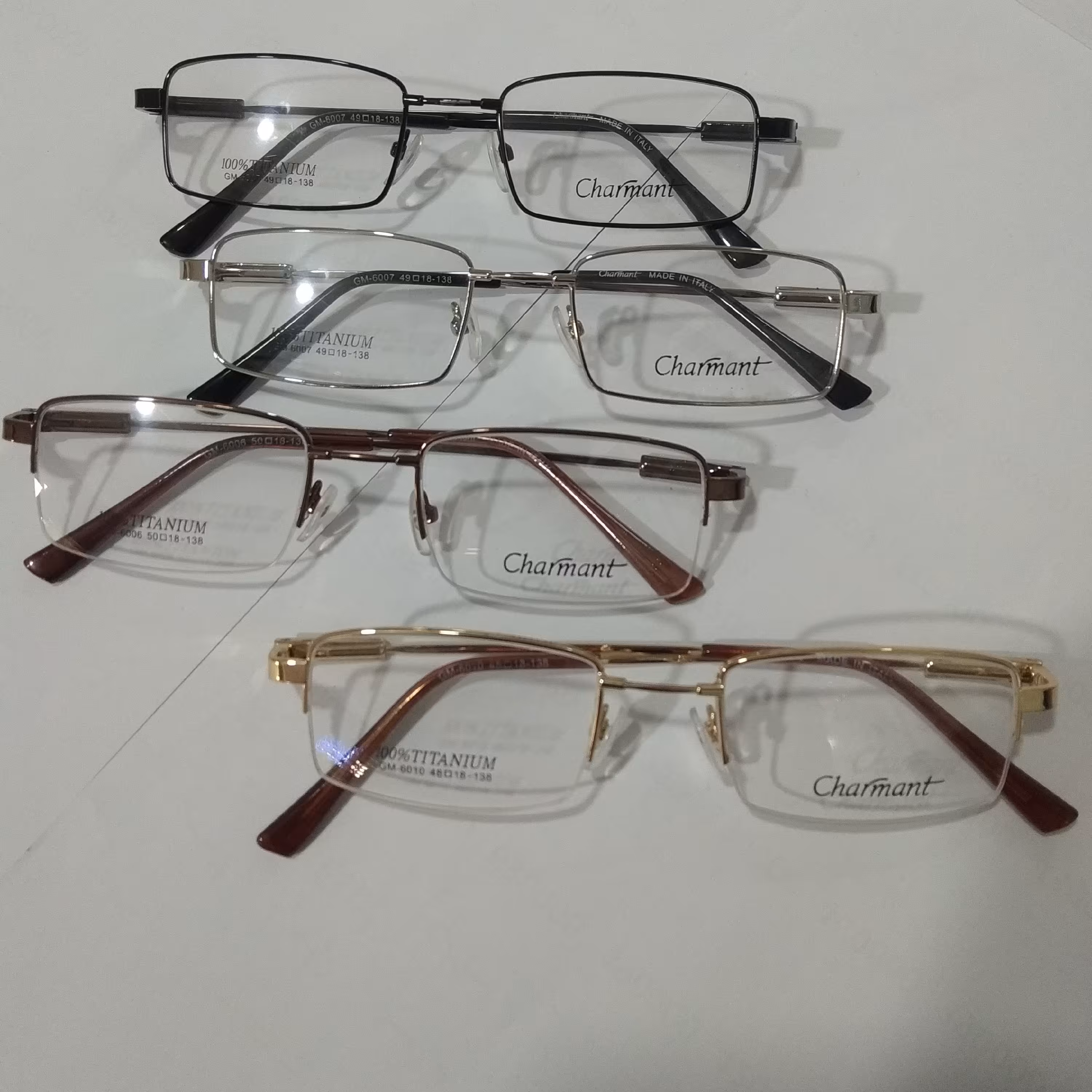 عینک طبی فلزی (اسپرت)برندcharmantوصد درصد تیتانیوم در دو مدل و سه رنگ