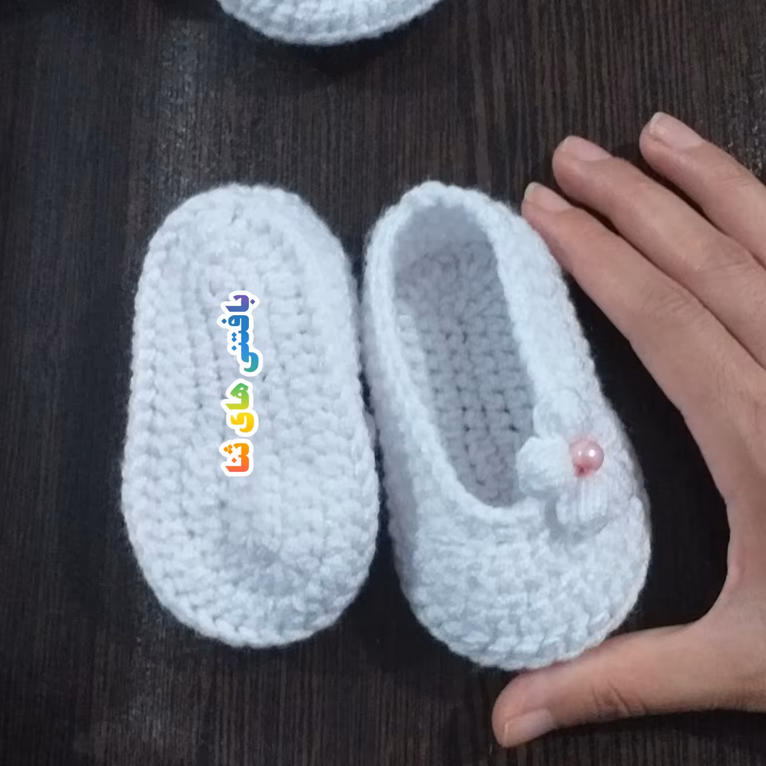 پاپوش نوزادی شکوفه ای سایز صفر تا 6 ماه در رنگبندی دلخواه درغرفه بافتنی های ثنا