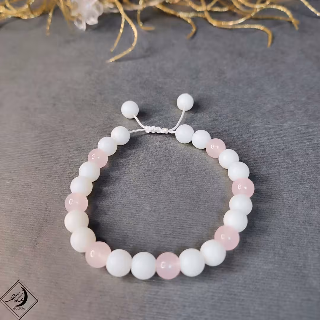 دستبند سنگی اونیکس سفید صورتی نخی و کشی