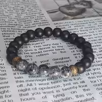 دستبند مردانه و زنانه
ساخته شده از سنگ اونیکس مشکی مات و سنگ آبرنگی خاکستری