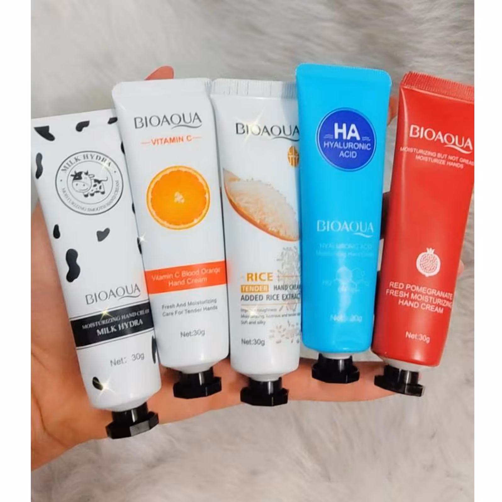 کرم دست بیوآکوا طرح جدید کرم مرطوب کننده دست پنج رایحه شیر و برنج و انار و پرتقال و هیالورونیک اسید