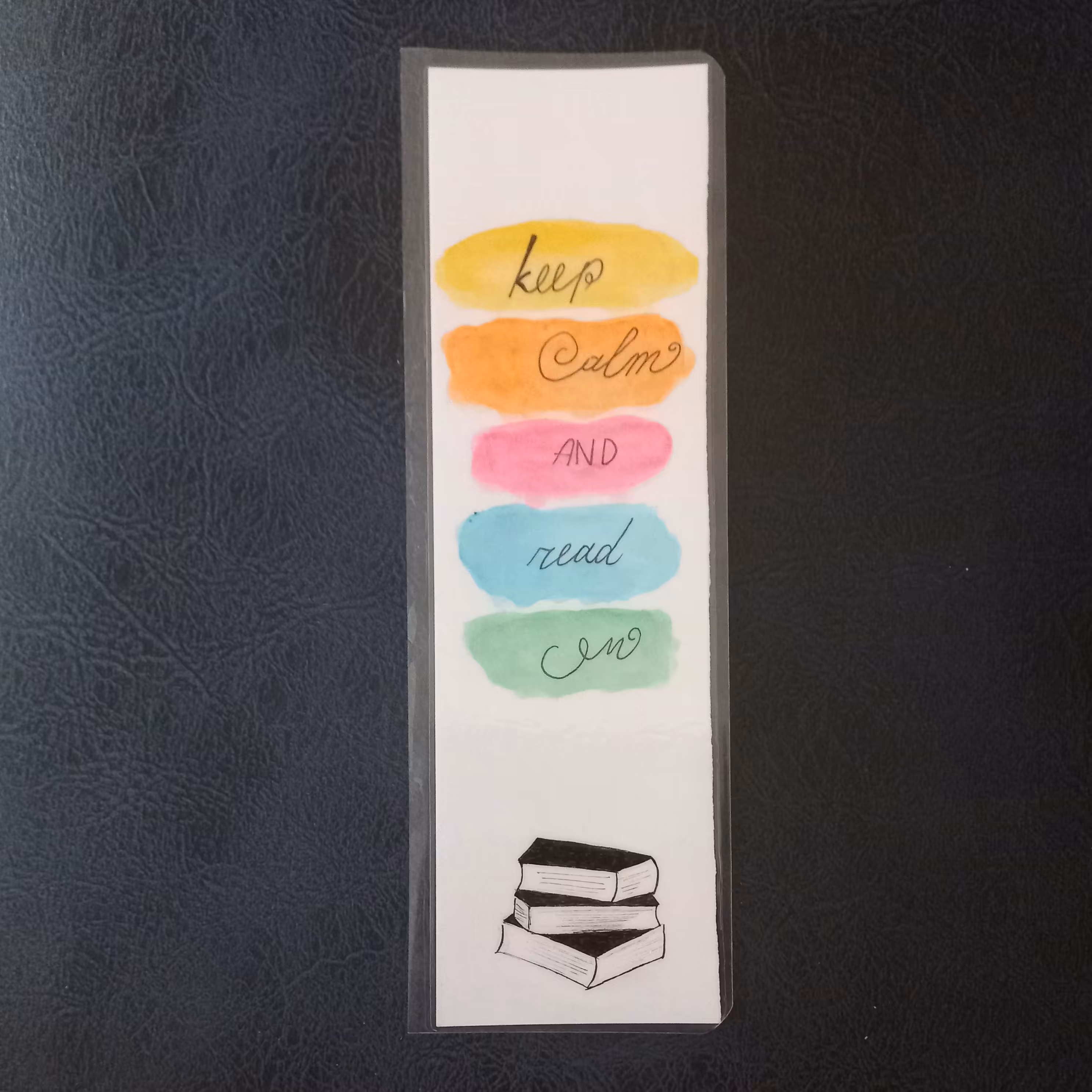 نشانگر کتاب نقاشی شده روی مقوا و لمینت شده طرح نوشته