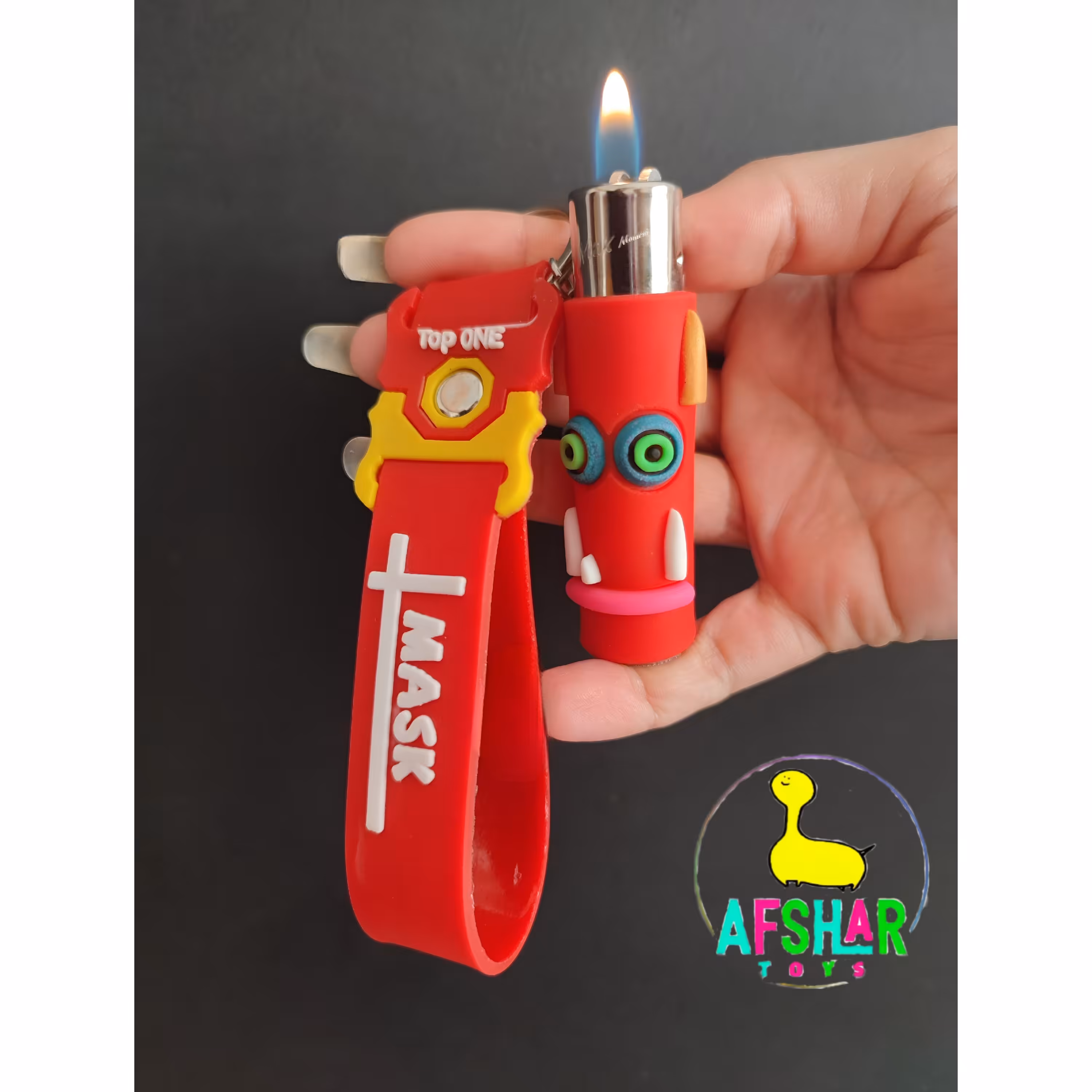 جاسوئیچی فندک فانتزی سیلیکونی در دو رنگ قرمز و صورتی 