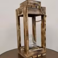 فانوس آویز  روشنایی دارد همراه باشمع سکه ای وحباب شیشه ای برای قرار دادن  روی شمع