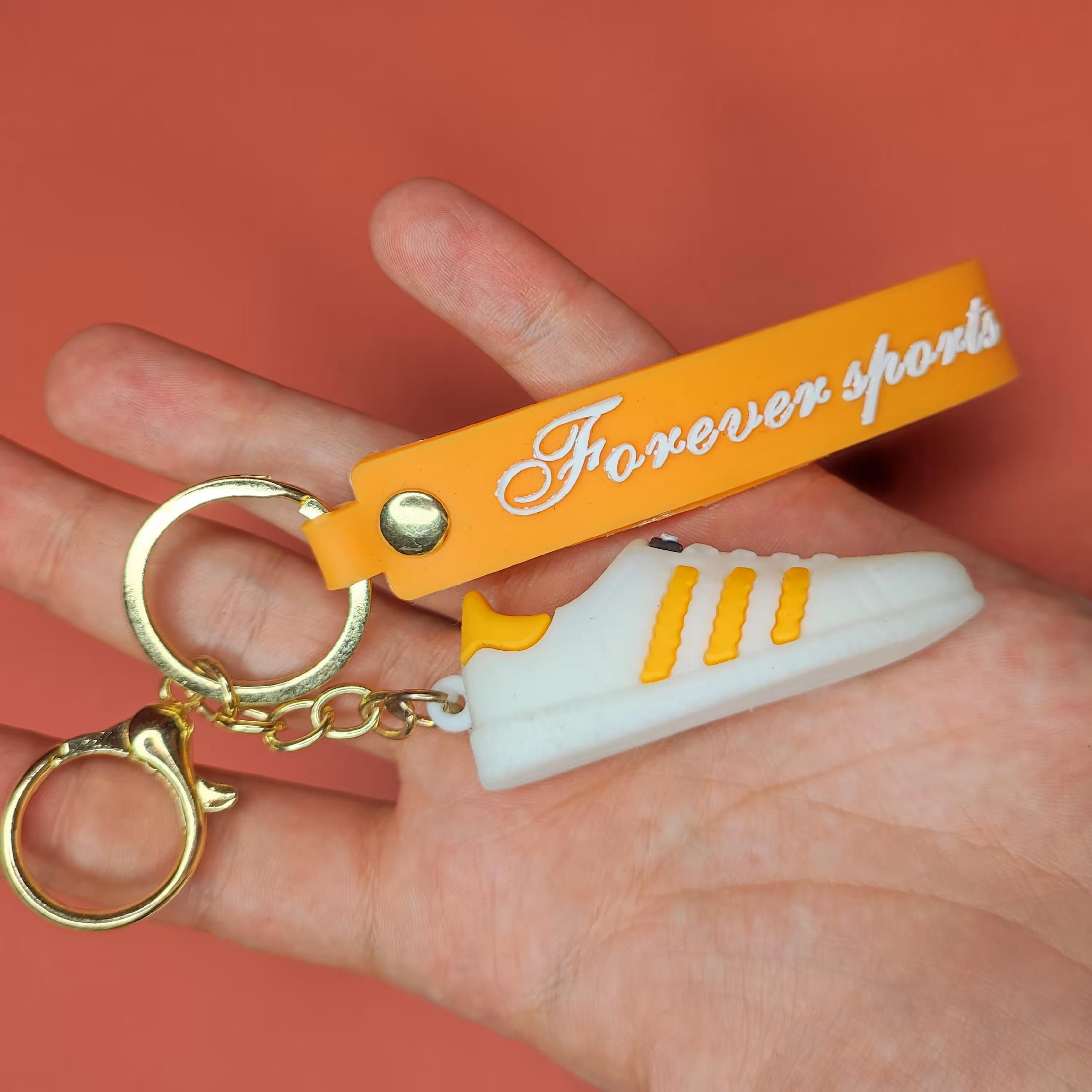 جاکلیدی سیلیکونی مدل کفش آدیداس بدون ساق رنگ زرد