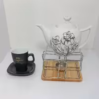 قوری گل برجسته سرامیکی . قوری دمنوش . قوری چای . قوری تک نفره . قوری گل دار ،چای خوری ، قهوه خوری ، صبحانه خوری،پسکرایه