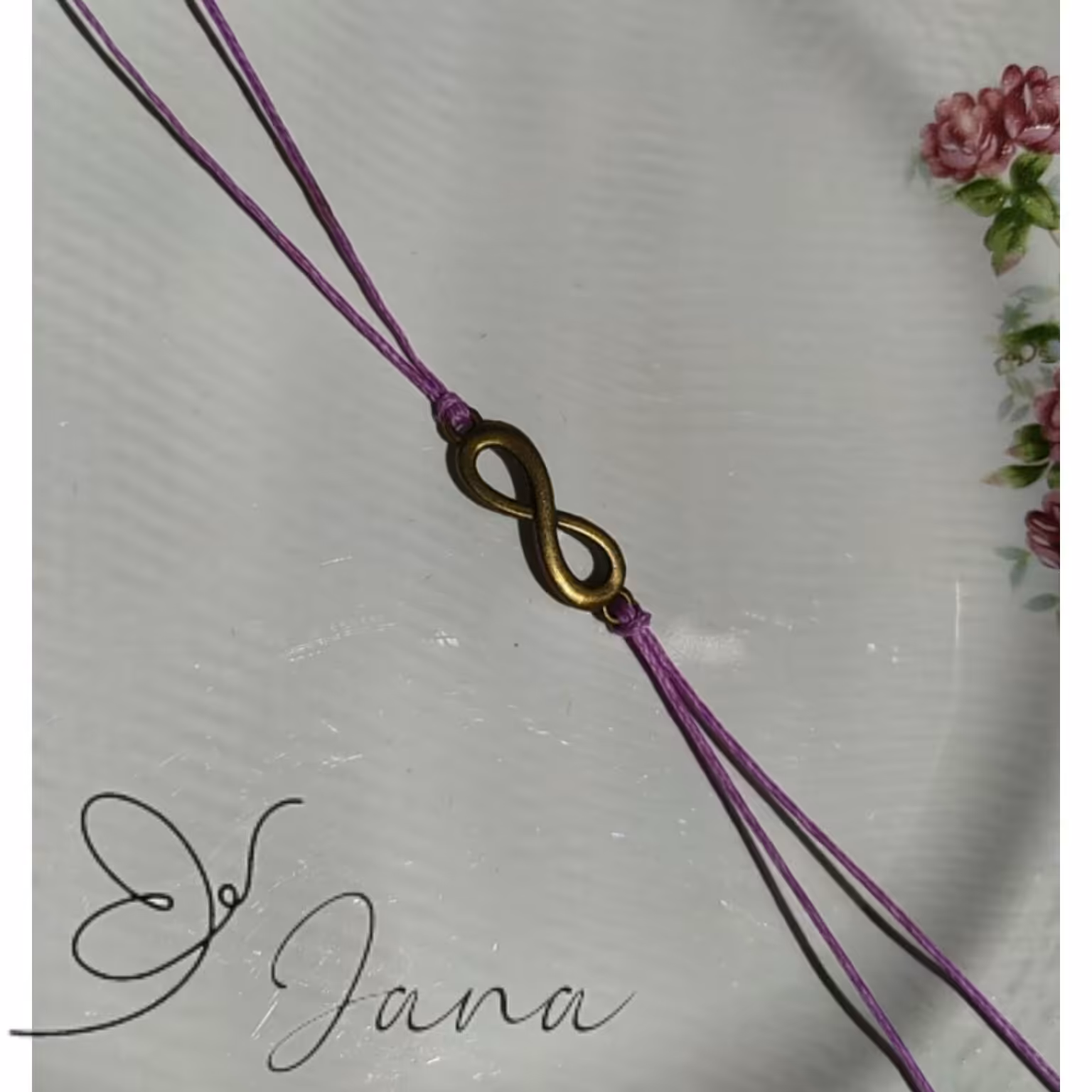 دستبند مینیمال بی نهایت برنجی فری سایز گره کشویی بنفش