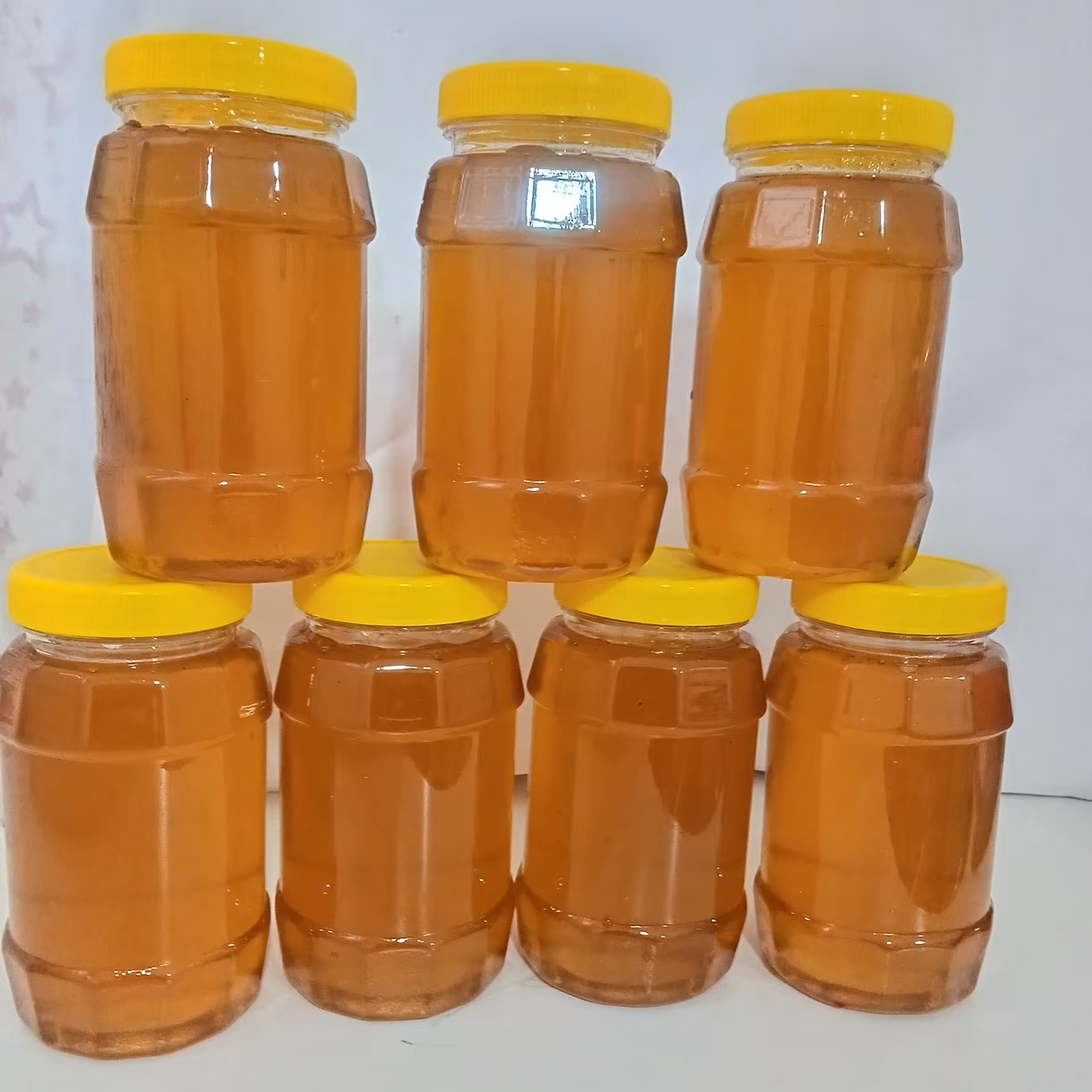 عسل برداشت اول یک کیلویی کاملا طبیعی با طعم وعطرو بافت منحصر به فرد
