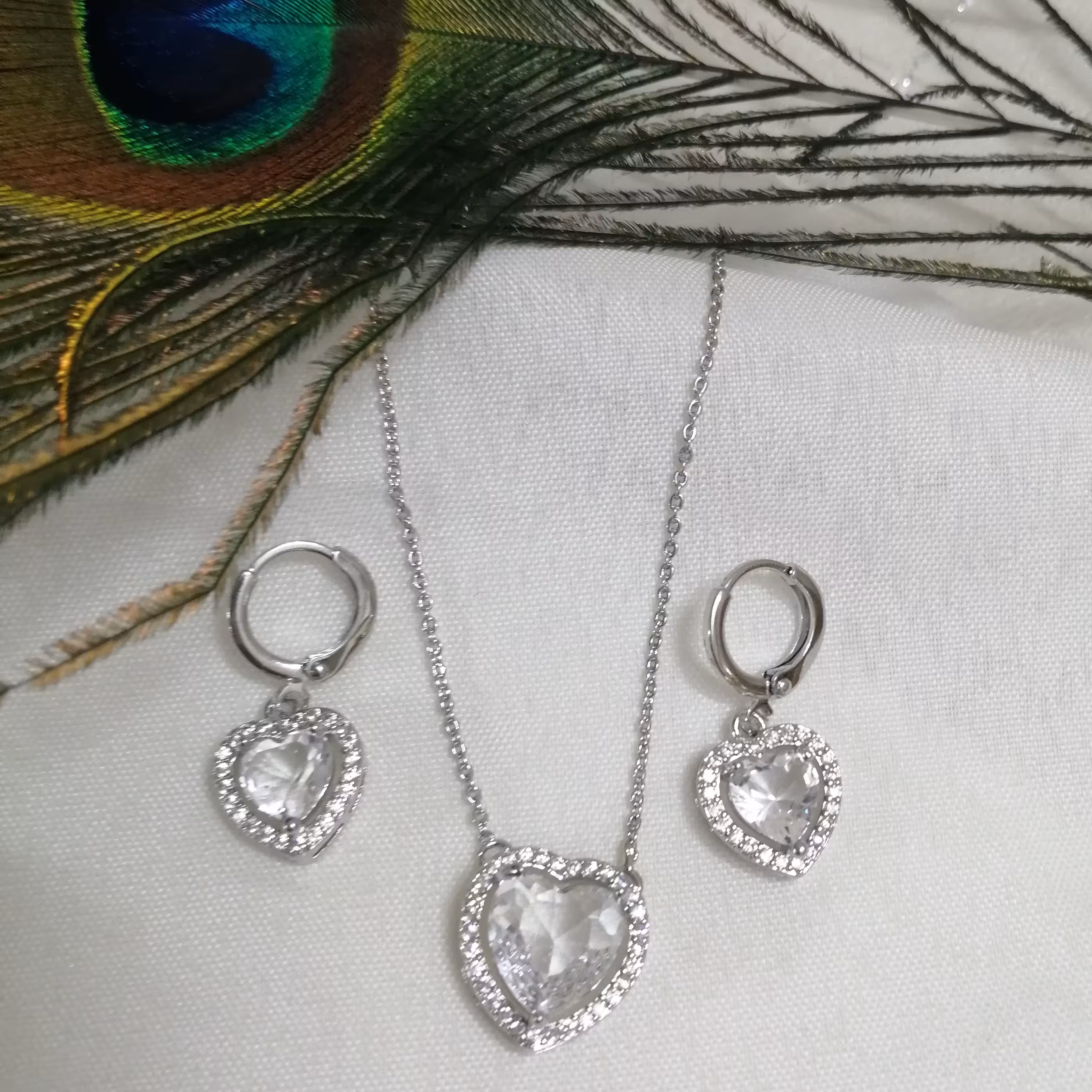 نیم ست قلب کریستالی از برند معروف YSX با رنگ ثابت در زیورآلات زرسان گالری 