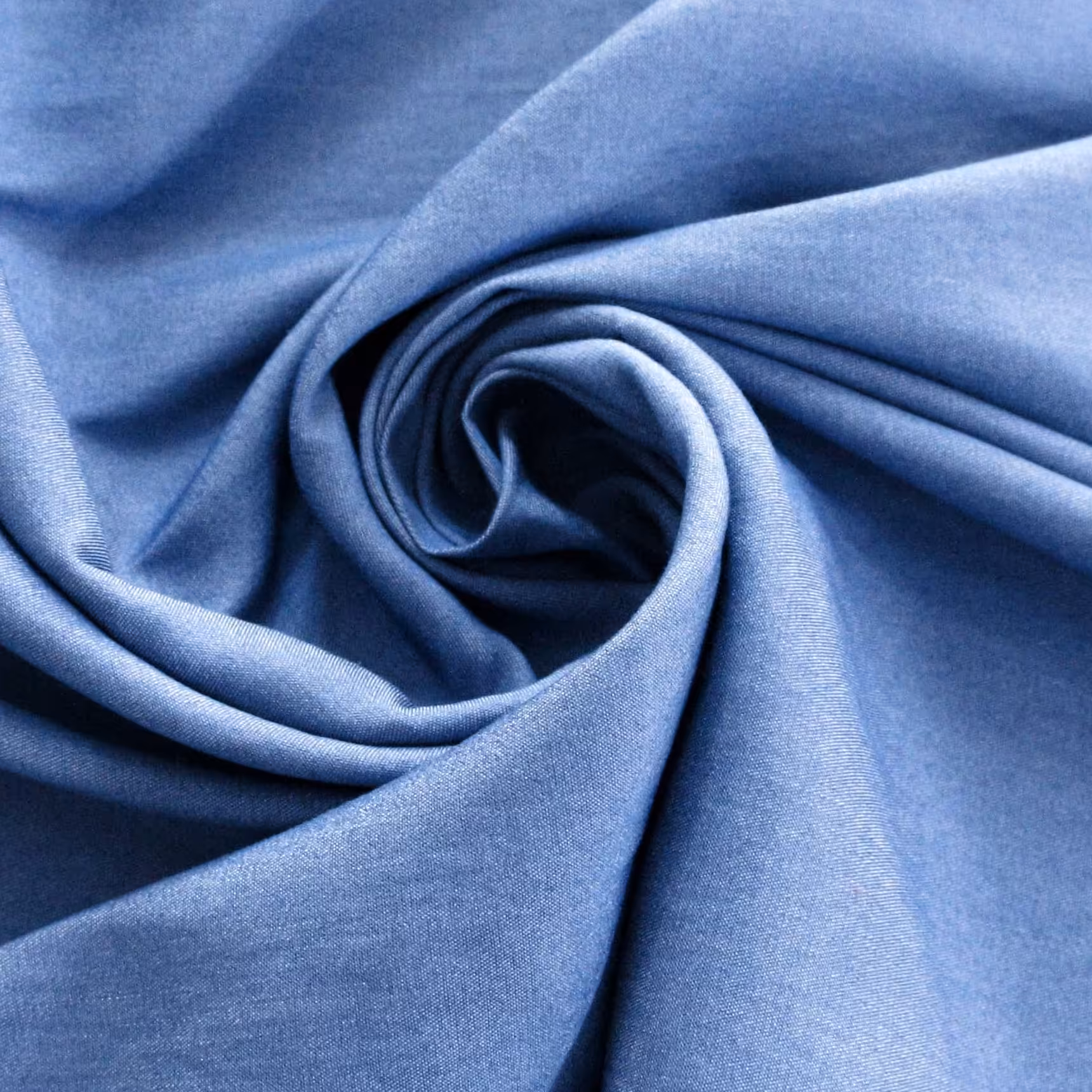 فروش ویژه ته طاقه پارچه جین کاغذی آبی 140سانتیمتر