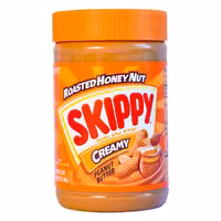 کره بادام زمینی Skippy مدل CREAMY تفت داده شده با عسل وزن 453 گرم
