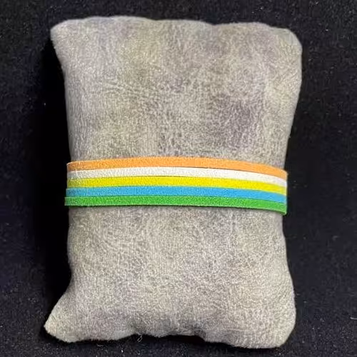 دستبند مدل تریشه چرمی ساده چند رنگ با زنجیر تنظیم سایز دستبند