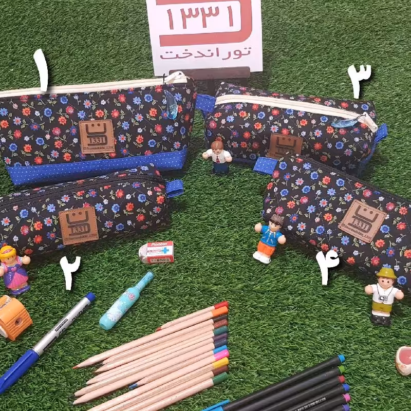 جامدادی پارچه ای در دو مدل و دو سایز زمینه مشکی گلدار ریز