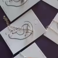 اویز نگهدارنده ایرپاد هندزفری طرح مار  طلایی تکی